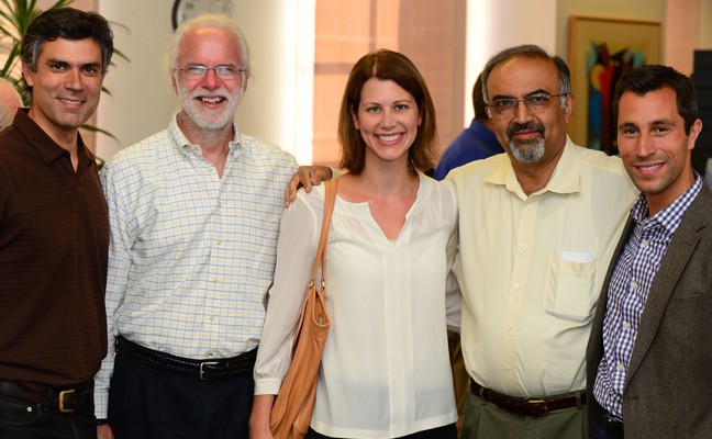 Five faculty members at an event