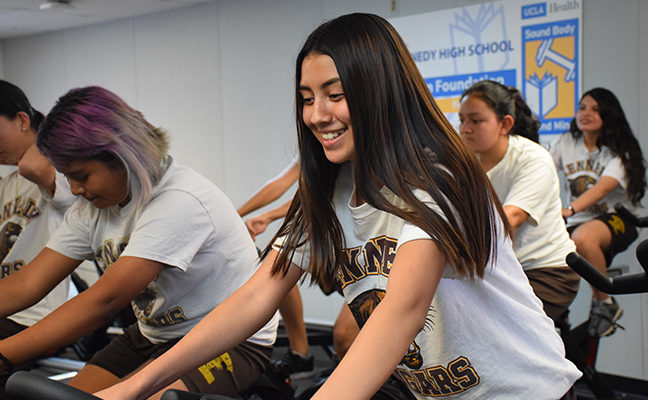 Female student cycling